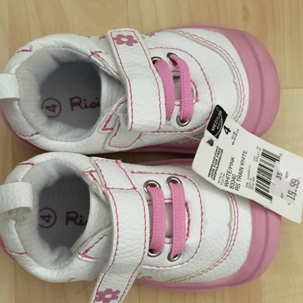 NWT. Cute white and pink toddler shoe.